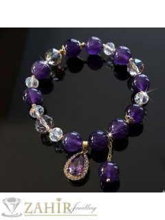   Изумителна ръчно изработена гривна с уникални австрийски кристали в безцветно и лилаво, позлатени мъниста и висулка великолепен лилав циркон, размер 17-19 см  - V1023