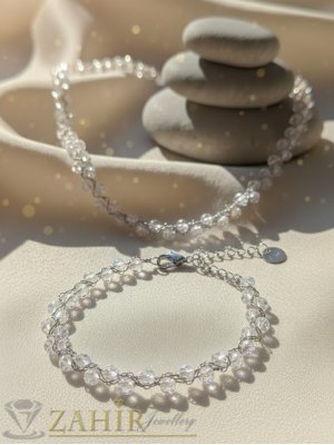    Много нежен комплект от фино колие тип чокър и гривна, изработени от прецизно фасетирани безцветни кристални мъниста, вълнообразна сребриста нишка, колие 3 дължини, гривна 17 + 5 см,  - N1625
